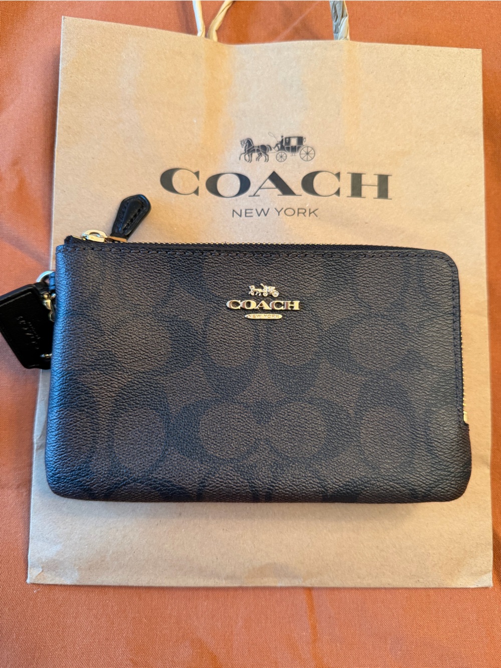 COACH Women’s double Signature Zip Wallet black and chocolate